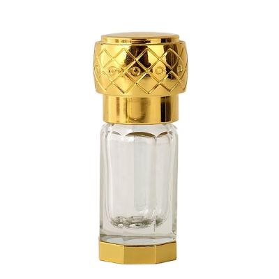 China Personal Care Fancy Empty Refillable Arabic Glass Essential Oil Bottles Small Arabic Crystal Perfume Bottle With Zamac Cap for sale