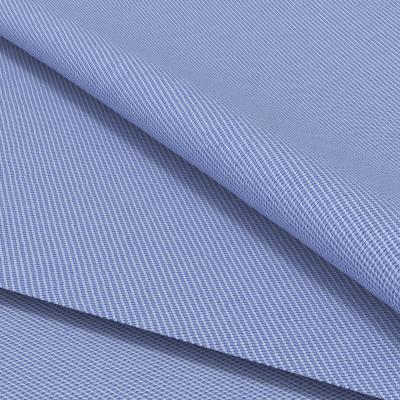 China Customization 100/2s Cotton Yarn Anti-Static Dobby Solid Midweight Woven Shirts Fabric Semi Plain Solid 100% Cotton Fabric for sale