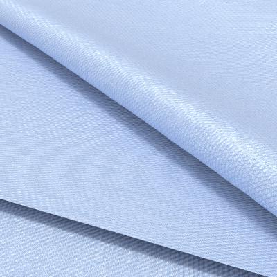 China Customization 100/2s Cotton Yarn Anti-Static Dobby Solid Midweight Woven Shirts Fabric Semi Plain Solid 100% Cotton Fabric for sale