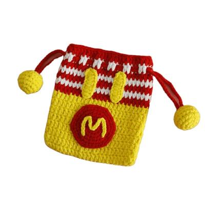 China Creative handmade woven zero drawstring bag purse with a zero opening, yellow crochet woven pocket of wool small for sale