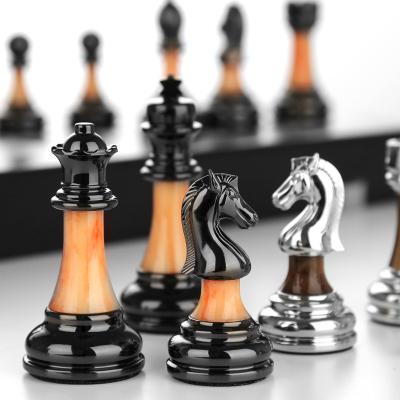 China Hot Sale Chessboard Wooden Chess Set Metal Folding High End Chess Pieces Wholesale Custom Folding Chess Set Board for sale