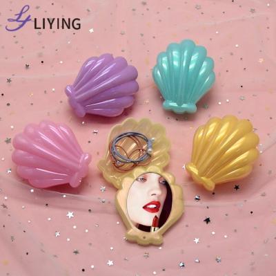 China Low moq mermaid shell shape custom makeup mirror private label plastic portable lashbox with mirror for sale