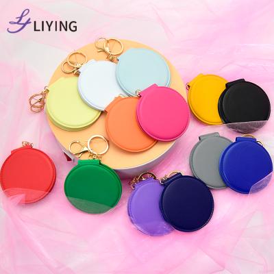 China Wholesale custom logo enlarging small MOQ double sided compact sublimation key chain mini makeup mirrors handbag for sale