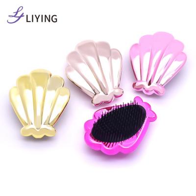 China Hot Selling Product Travel Shell Shape Straight Hair Detangle Brush Waterproof Hot Selling Comb for sale