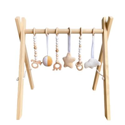 China Eco-friendly.anti-slip.water-proof Foldable Wooden Baby Play Gym Montessori Frame Activity Mat Baby Gym With 3 Teething Toys Nordic Hanging Baby Gym for sale