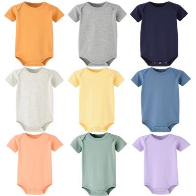 China Cozy baby clothes 2023 100% cotton plain babies romper knitted newborn baby clothes short sleeve jumpsuit for sale