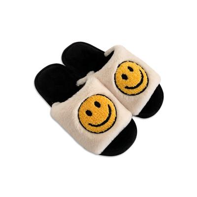 China Fashion Trend High Quality Ladies Smile Face Cute Fleece Fuzzy Slippers for sale