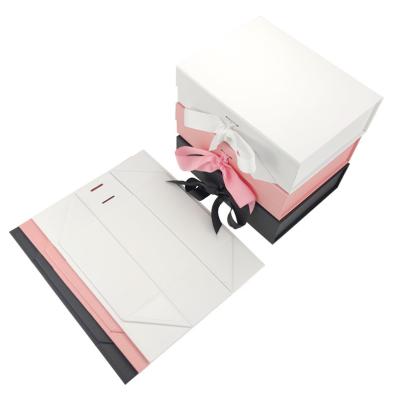 China Recycled Custom Black Rigid Magnetic Closure Packaging Materials Foldable Paper Gift Box With Ribbon for sale