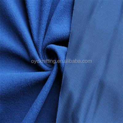 China Factory supplier 220gsm antistatic dark blue 100% polyester side knit brushed poly super velor/velor antistatic fabric for school uniform/coat for sale