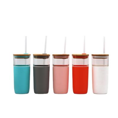 China Sustainable Multi-colors Custom Silicone Sleeves Clear Bamboo Lids Travel Drink Glass Tumbler With Straw for sale