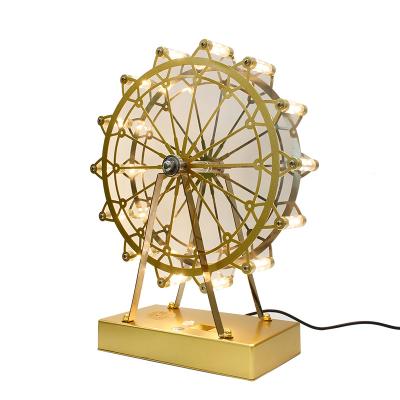 China 2022 high quality modern western room led table lamp of ferris wheel home decoration restaurant atmosphere desk for sale