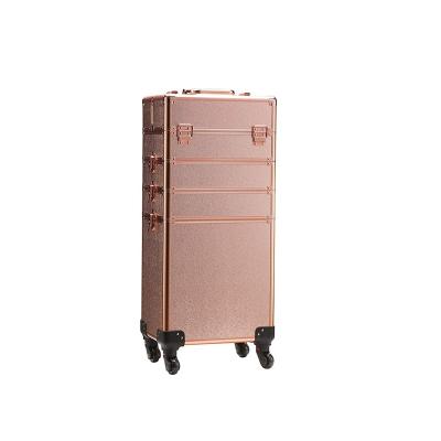 China Durable 4 in 1 Aluminum Professional Cosmetic Case Pink Beauty Storage Trolley Rolling Case with Large Folding Trays Compartments for sale