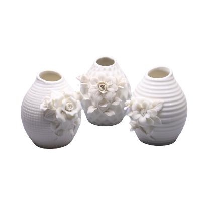 China (1300 Degree) Home Decoration Antique Porcelain High Temperature Fired Chinese White Ceramic Vase With Embossed Handmade 3D Flower for sale