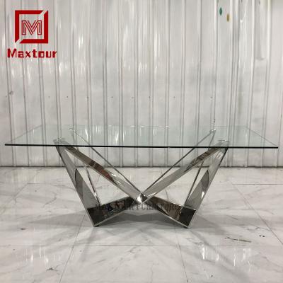 China Italy Style Modern Design Luxury Stainless Steel Glass Dining Table for sale