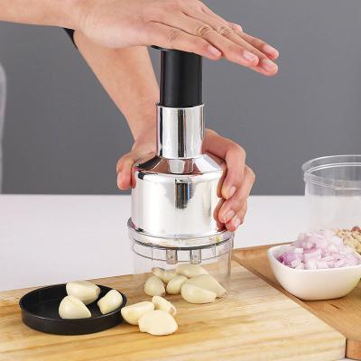 China Viable Multifunctional Vegetable Chopper Food Cutter Meat Grinder Stainless Steel Kitchen Instruments Nuts Hand Garlic Press Crusher Onion Grinder for sale