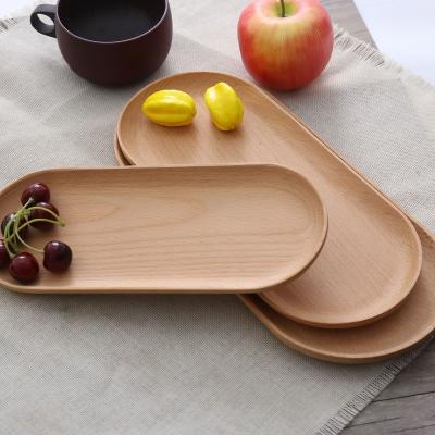 China Home Viable Wooden Restaurant Solid Wood Tray Japanese Beech Tray Cake Sushi Bread Oval Snack Tray for sale