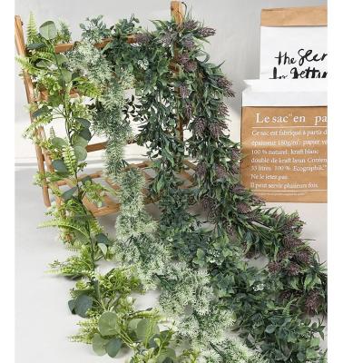 China Modern Wholesale Artificial Vines Faux Eucalyptus Garland Eucalyptus Greenery Garland Wedding Backdrop Arch Wall Decor for sale