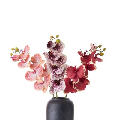 China Natural Touch 7 Heads phalaenopsis Hot-selling Orchid butterfly christmas artificial Latex Real Touch flower for wedding decoration for sale