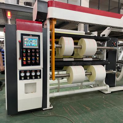 China Retail Turret Self Adhesive Paper Roll Slitting Rewinding Machine With Automatic Unloading And Knife Positioning System for sale