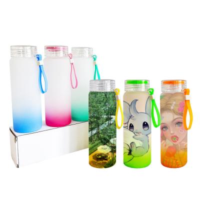 China Sustainable Hot Sale Custom Creative 17OZ Sublimation Gradient Colorful frosted Glass Water Bottle With Lid And Portable Rope for sale