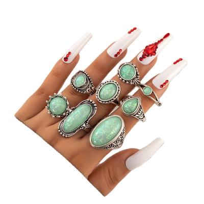 China 2023 New Ethnic Style CLASSIC Retro Inlaid Turquoise Carved Feather Ring Fashion Personality 8 Piece Combination Ring Set for sale