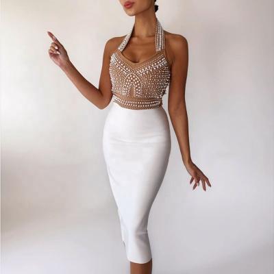 China High Quality Anti-Static Halter Girl Beading Bodycon Khaki Top And Long Skirt Set Women Party Clothes for sale