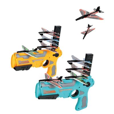 China Electronic Toy Hot Selling Foam Flat Hand Launched For Toys Flying Flat Launcher Cannon For Outdoor Games for sale