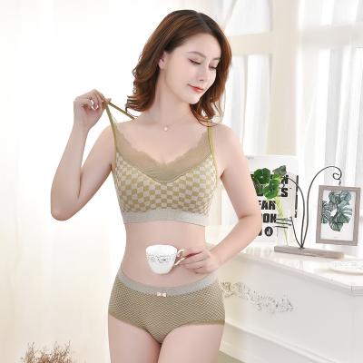 China New design seamless lace up floral triangle cup and comfortable women panties and breathable tube tops seamless cross strap bra set for sale