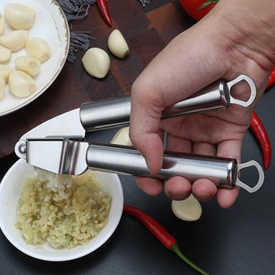 China Viable Hot Sale Kitchen Multifunctional Manual Press The Stainless Steel Garlic Mincer and Crusher Garlic Press for sale