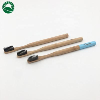 China Eco Friendly Bamboo Toothbrush Logo Engraved With Charcoal Tapered Bristle Adult Toothbrush for sale