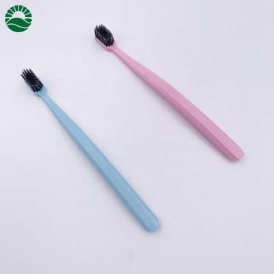 China BPA Free Handle Cornstarch Daily Soft Biodegradable Bamboo Charcoal Stiffens Toothbrush for sale