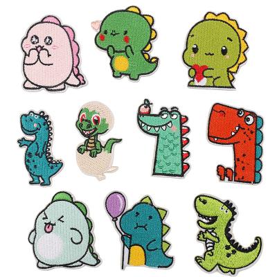 China 3D Cotton Color Dinosaur Embroidered Fabric PVC Soft Patch Dinosaur Egg Clothes Patch Cartoon Embroidery for sale