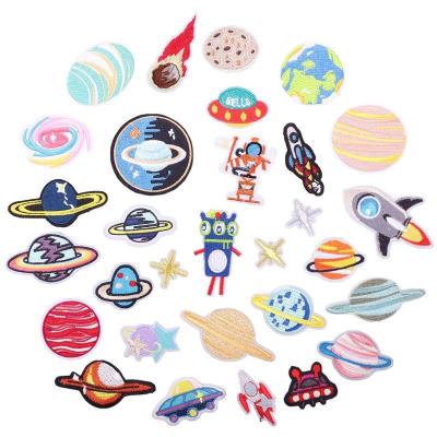 China soft patch astronaut 3D spaceship planet embroidery fabric pvc patch cartoon microstamp rocket computer embroidery label for sale