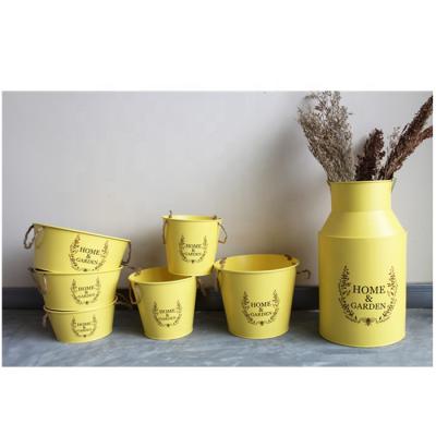 China Simply Yellow Color Galvanized Garden Flower Pot for sale