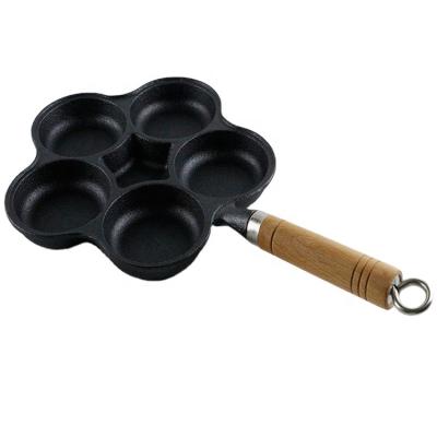 China Household Sustainable Round Black Cast Iron Vegetable Oil Six Cup Handle Wooden Fried Egg Cake Molds for sale