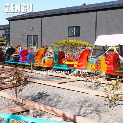 China Amusement Park Steel Dinosaur Steel Train Rides On Sale for sale