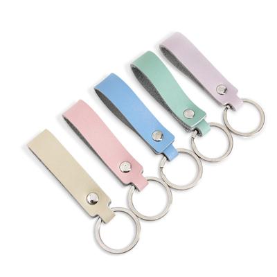 China Promotional Fashion Strap Keychains, Premium Genuine Leather Carabiner Mute Keychain Keychains for sale