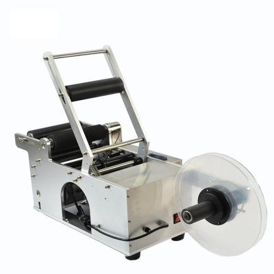 China HBL-M103T semi automatic food labeling machine for transparent labels for sale