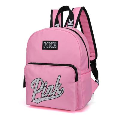 China Fashion Waterproof Leisure Students Pink Backpack School Bags For Girls for sale