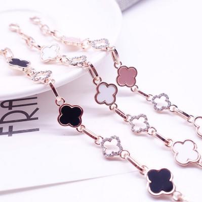 China 2021 TRENDY Four Petals Flower Women Rhinestone Bracelet Chain for sale