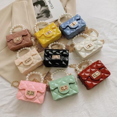 China Fashionable Portable Kids Designers Bag Cute Pearl Mini Jelly Bag Wholesale Little Girl Handbag Kids Cross - Body Chain Bags for sale