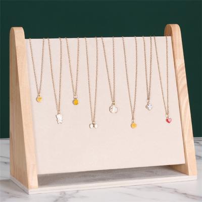 China Creative New Morden Window Props Show Bracket Fashion Jewelry Stand Necklace Display Rack Custom Jewelry Display for sale