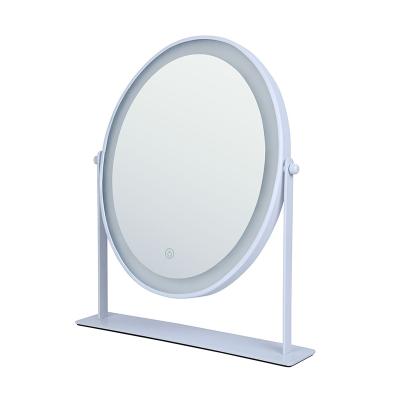 China New Styles Lighted 360 Degree Rotating Frame Position Vanity Table Oval Metal Frame Mirror Table With Led Light for sale