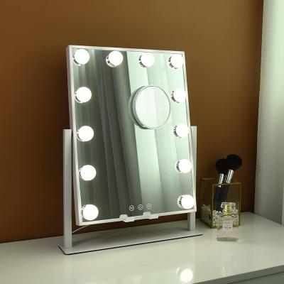 China Modern Hot Sales 12 Bulbs Hollywood Vanity Mirror With Phone Mount Phone Socket And 10X Magnifying Spot Mirror for sale