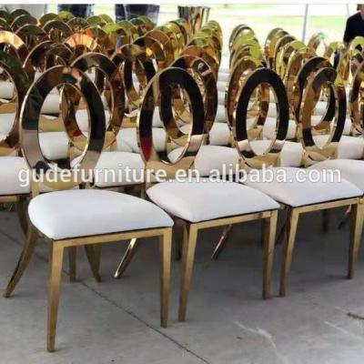 China Elegant stainless steel chair with clear hollow back for wedding party for sale