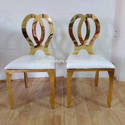 China Elegant stainless steel chair with clear hollow back for wedding for sale