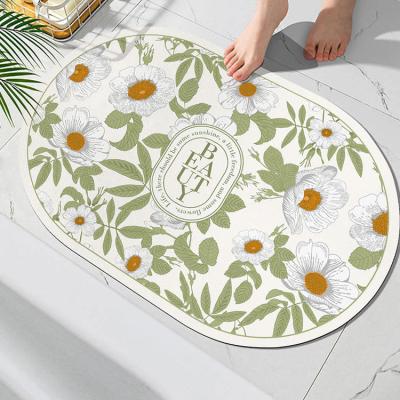 China Low Price Diatomite Bath Mat Rug Fast Dryig Floor Non Slip Washable Floral Water Bath Mat Absorbent Mat for sale