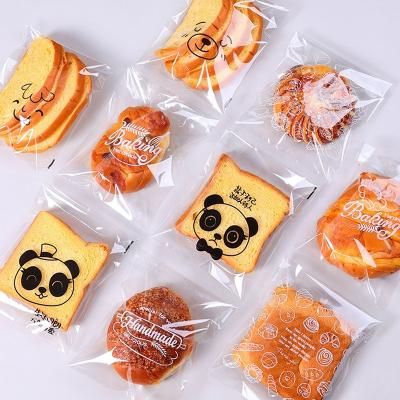 China 100Pcs Transparent Self Adhesive Cute Cartoon Bread Dough Pineapple Animal Muffins Recyclable Baked Sliced ​​Toast Packaging Bags for sale