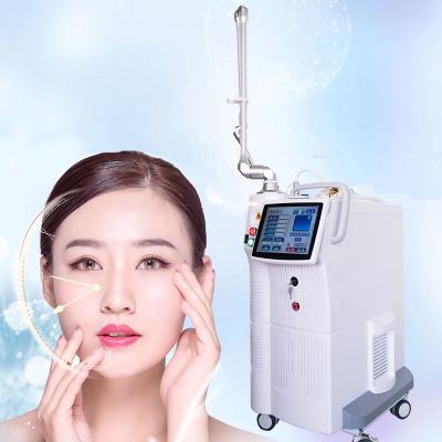 China Wholesale price Anti-puffiness partial CO2 laser skin resurfacing machine acne scar removal carbon lazer treatment for clinic salon for sale