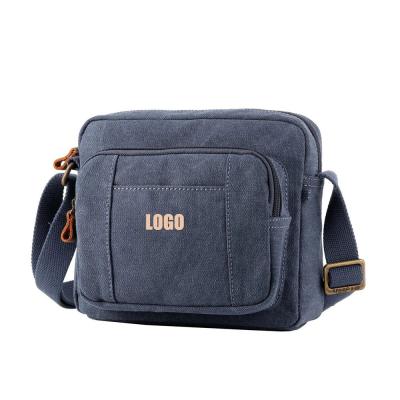 China Lightweight Brass Plated Buckle Ladies Messenger Bags Small Shoulder Bag Men Mini Messenger Bag for sale